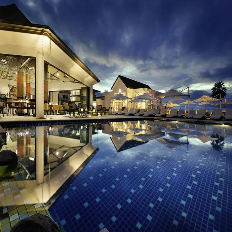 Anassa Hotel Paphos — boutique hotel with Greek colonnades, olive gardens and the sea