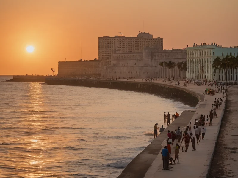 Havana's Malecón — sunset over the Caribbean bay with colourful houses